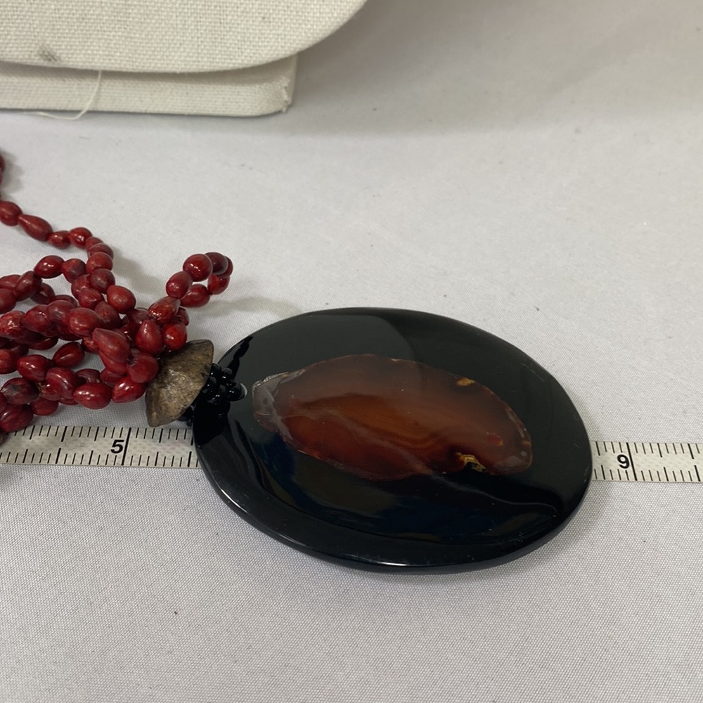 Beautiful multi strand red seed bead necklace with large medallion - Picture 6 of 9